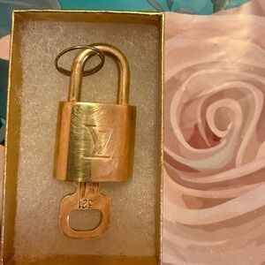 Gold Louis Vuitton Padlock Keychain or necklace